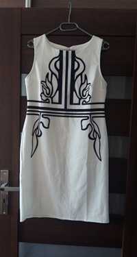 Nowa elegancka biała sukienka