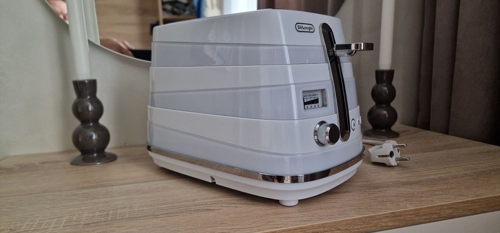 Продам тостер DeLonghi