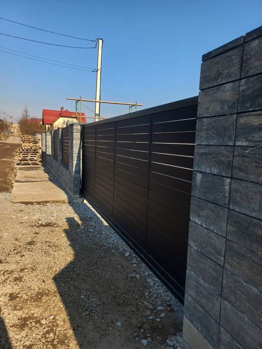 Виготовлення відкатних воріт та навісів під авто