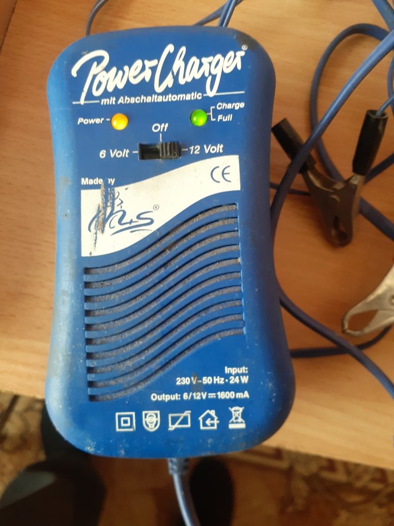 Универсальное зарядное Power Charger.Из Германии