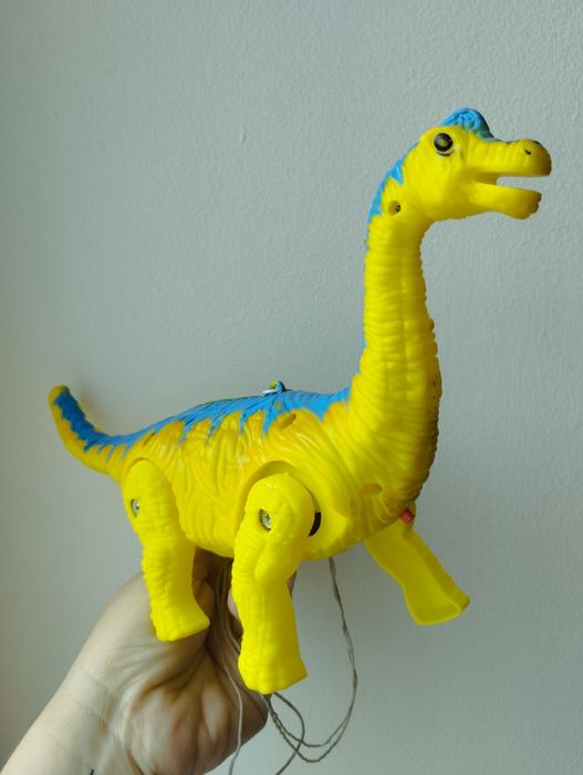 Динозавр іграшка, світло, звук, ходить