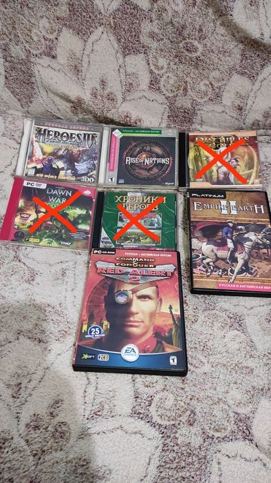 Диски с играми на компьютер.