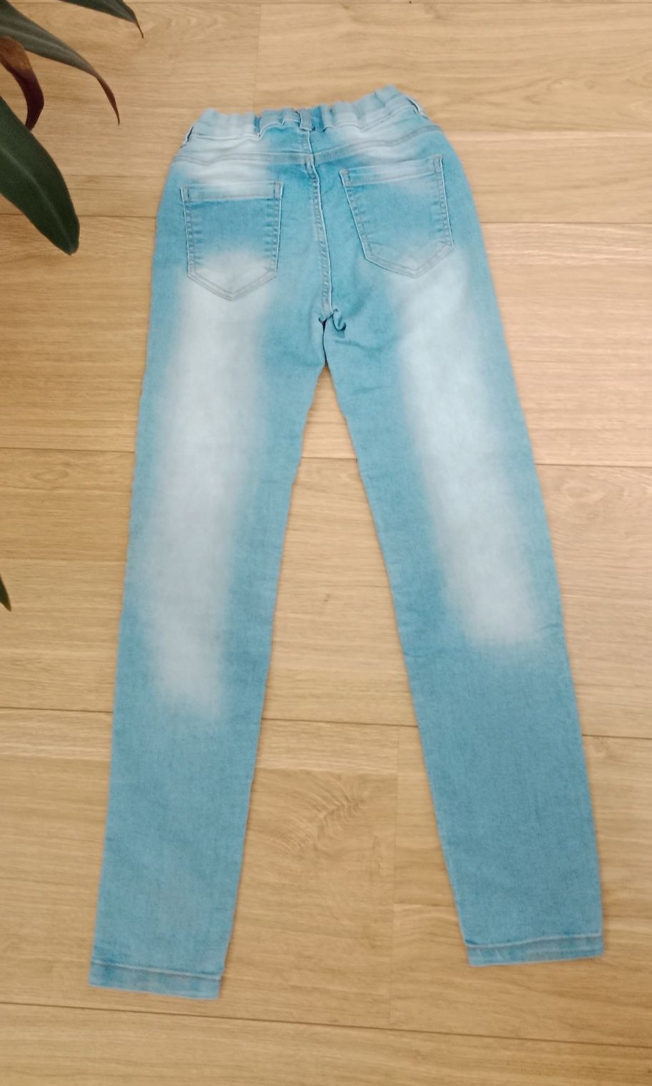 Spodnie jeansowe dla dziewczynki. Takko. Rozm. 146cm