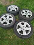 Felgi alu Peugeot 307 6,5x16 z oponami Uni Royal 205/55/16