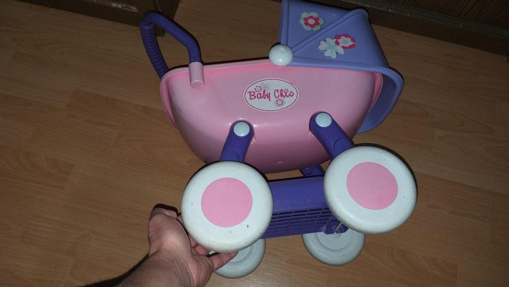 Детская игрушечная коляска