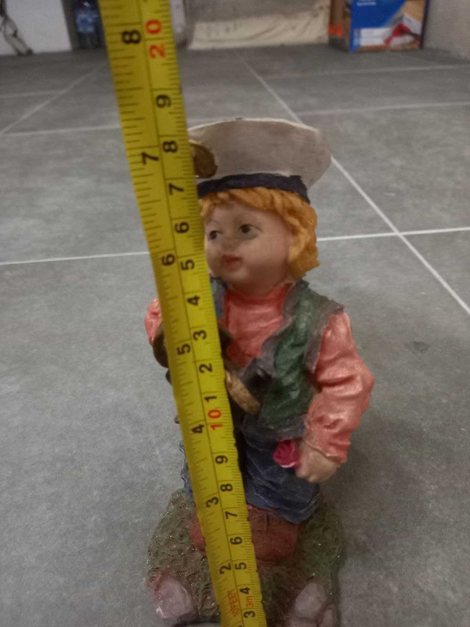 brinquedo (ou peça decorativa) em forma de marinheiro