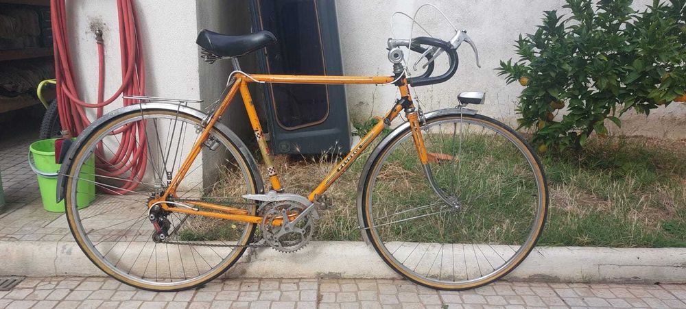 Bicicleta Peugeot randoneur vintage laranja roda 700c 28
Tamanho 56