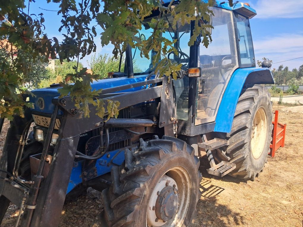 Ford 6640 85 cavalos  com carregador frontal e alfaias