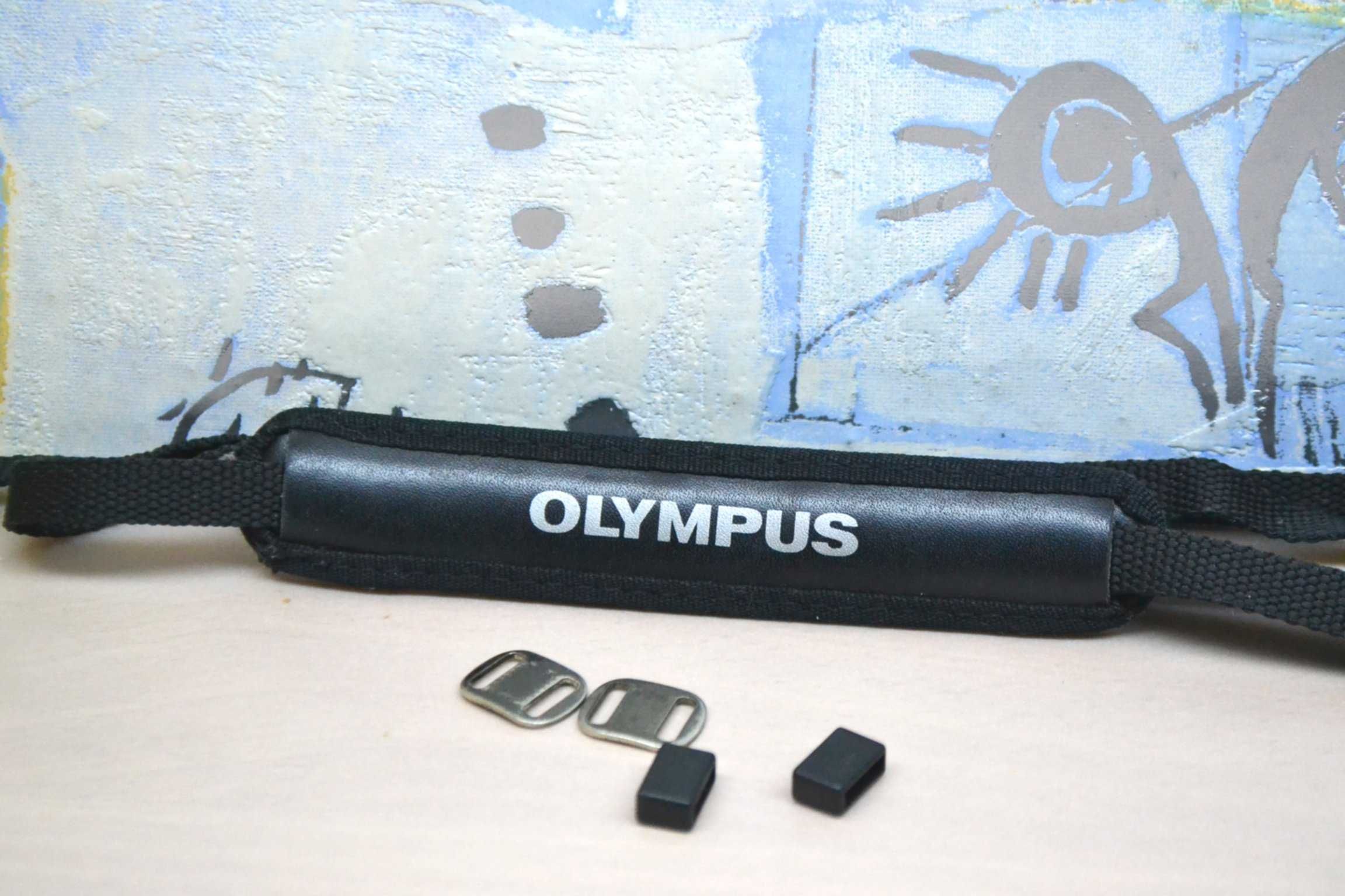 oryginalny pasek OLYMPUS do aparatu lustrzanki uni oryginał ładny