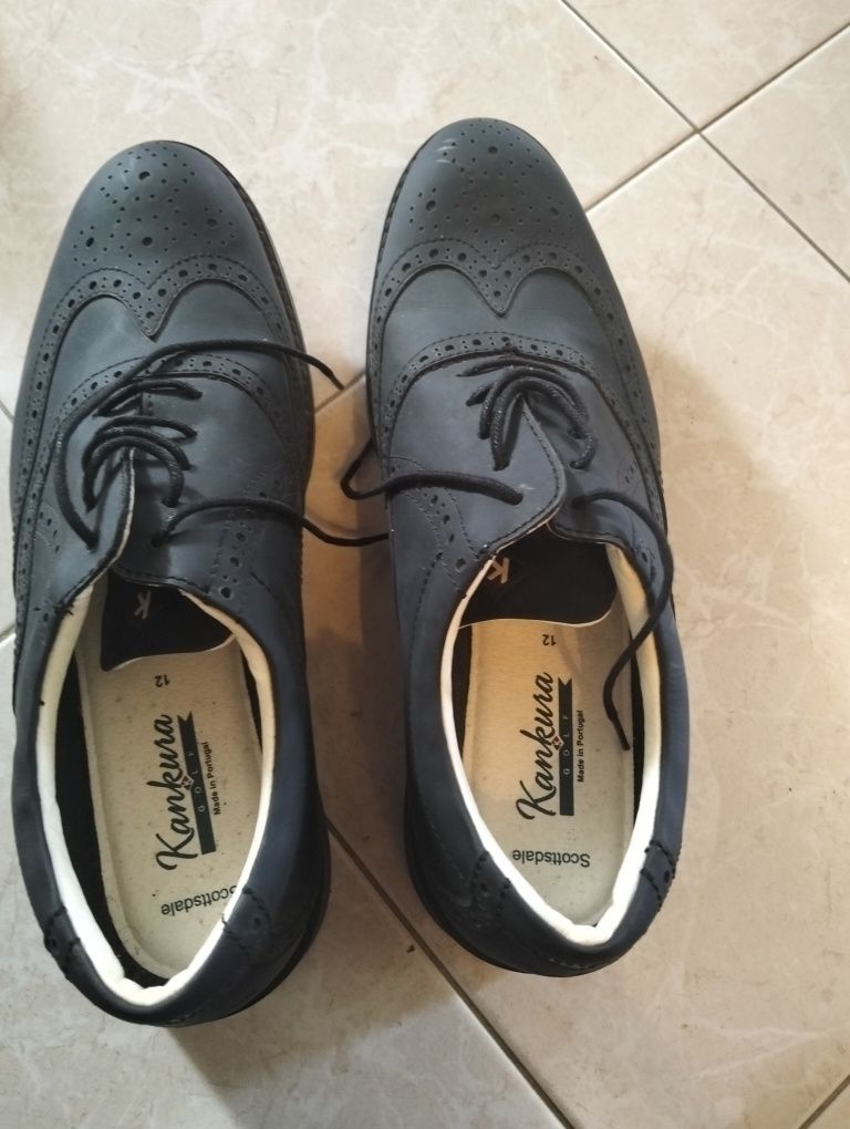 Sapatos de golfe