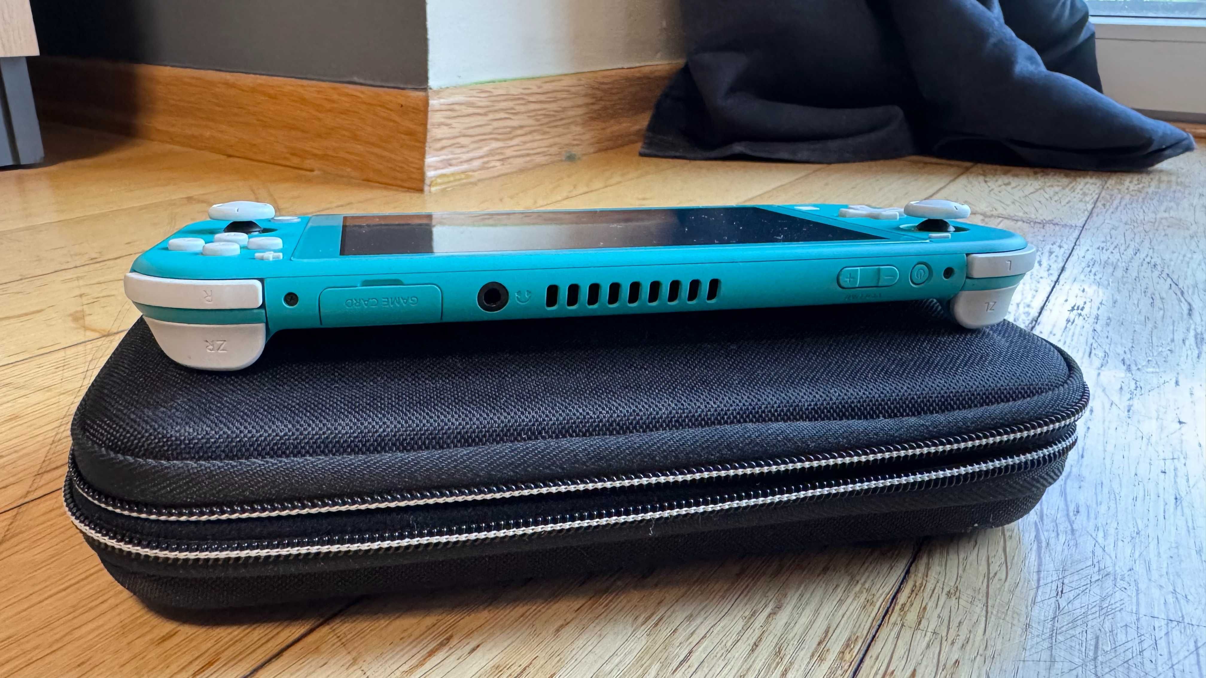 Nintendo Switch Lite Turkusowa + Minecraft, Animal Crossing, Etui
