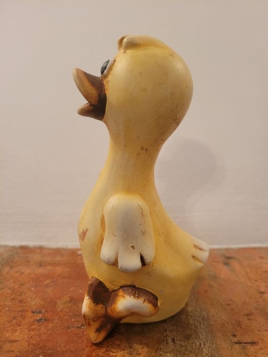 Pato amarelo cerâmico