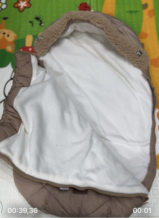 Конверт -кокон зимовий,ціна на сайтах от 1500 до 2000