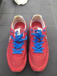 Le coq sportif vermelhos