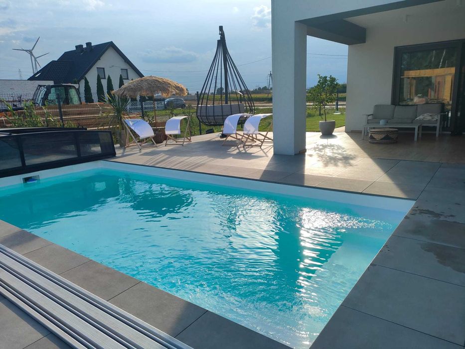 Kompleksowy montaż basenu montaż zadaszania basenowego konstrukcji