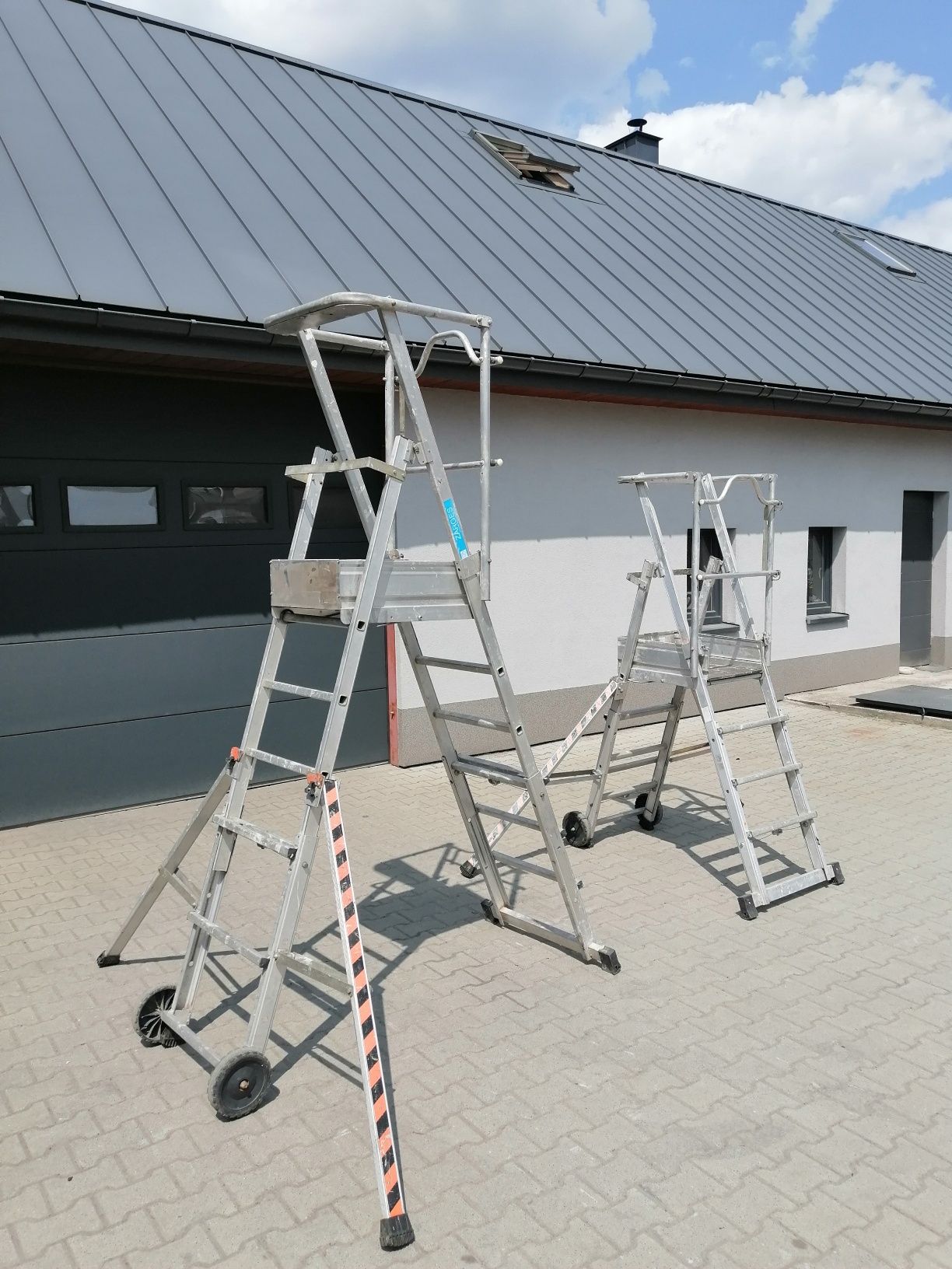 Drabina aluminiowa Zagres, podest roboczy, zasięg roboczy do 3,8m.