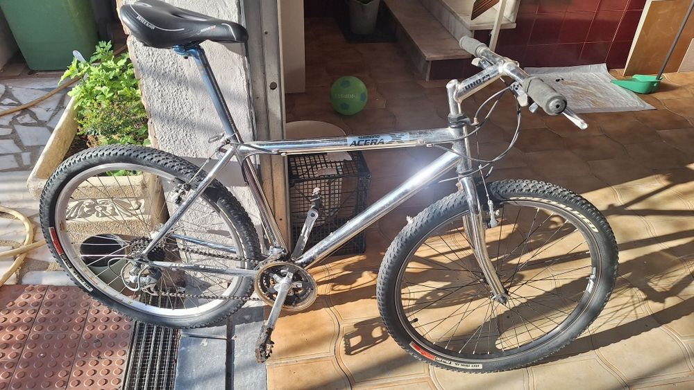 Bicicleta shimano cromada