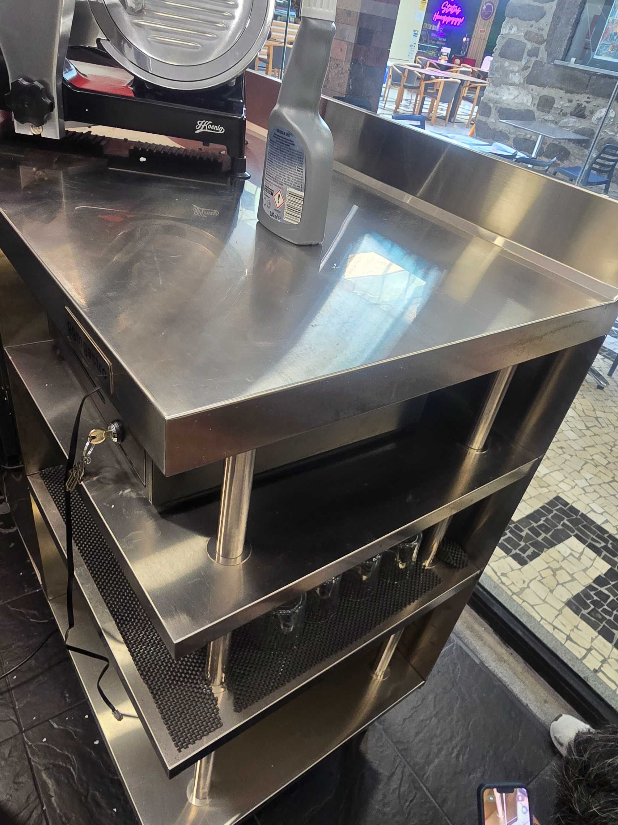 Vendo mesa de café de inox ,como nova com  2metros