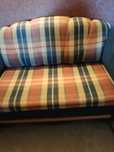 Ładna sofa rozkładana plus fotel.