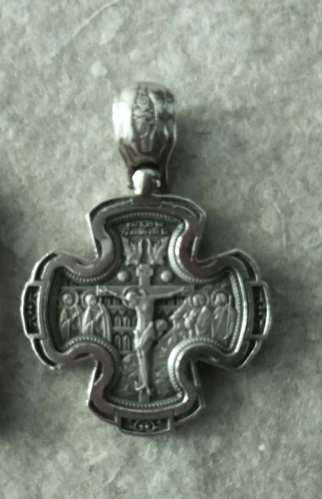 Двосторонній срібний хрестик з храму.