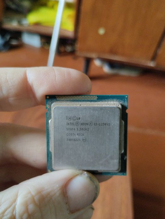Продам процессор с кулером Intell Xeon e3-1230v2..