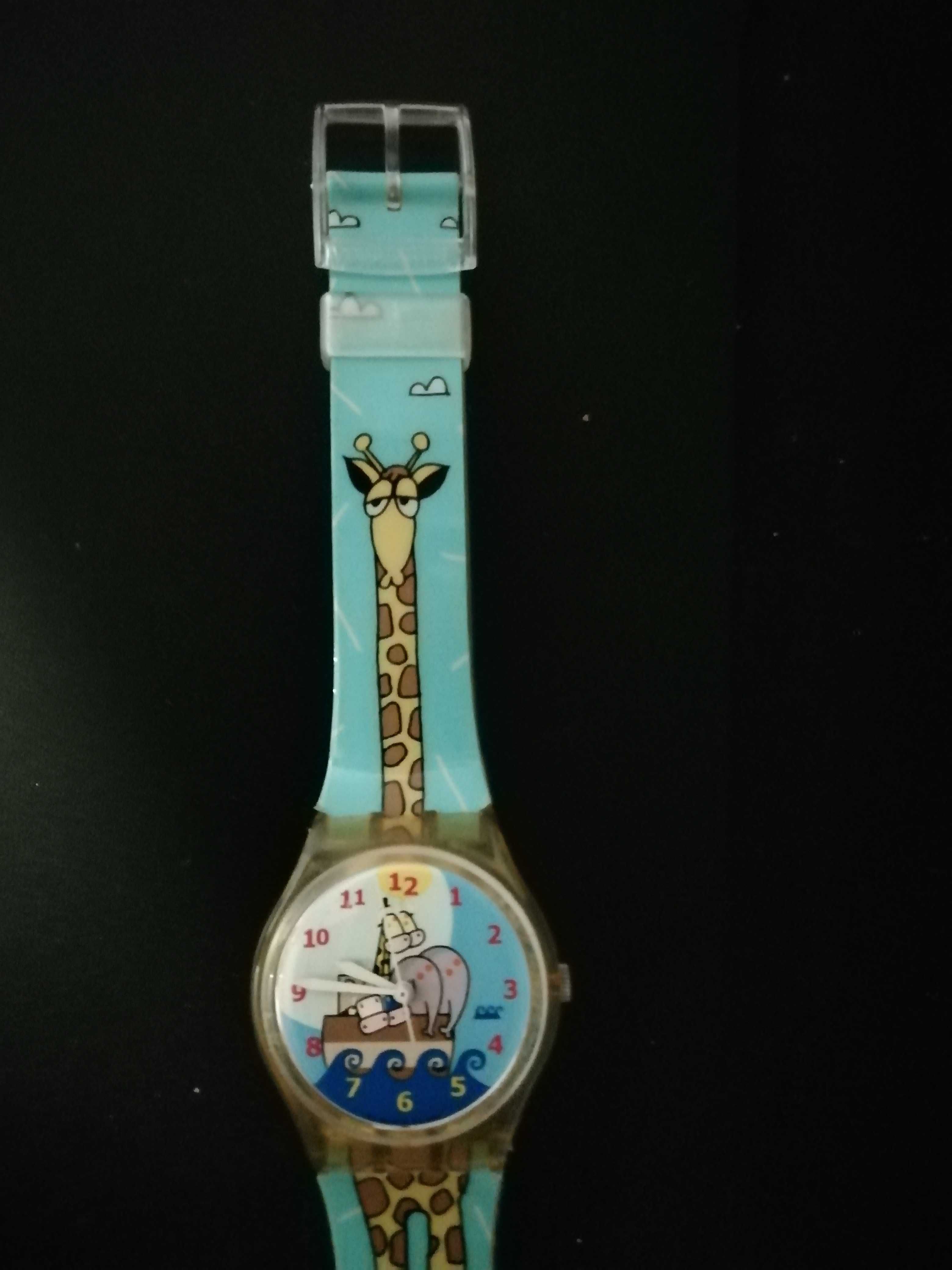 Relógio swatch	Fundo arca de Noé e bracelete com girafa. Como Novo !!