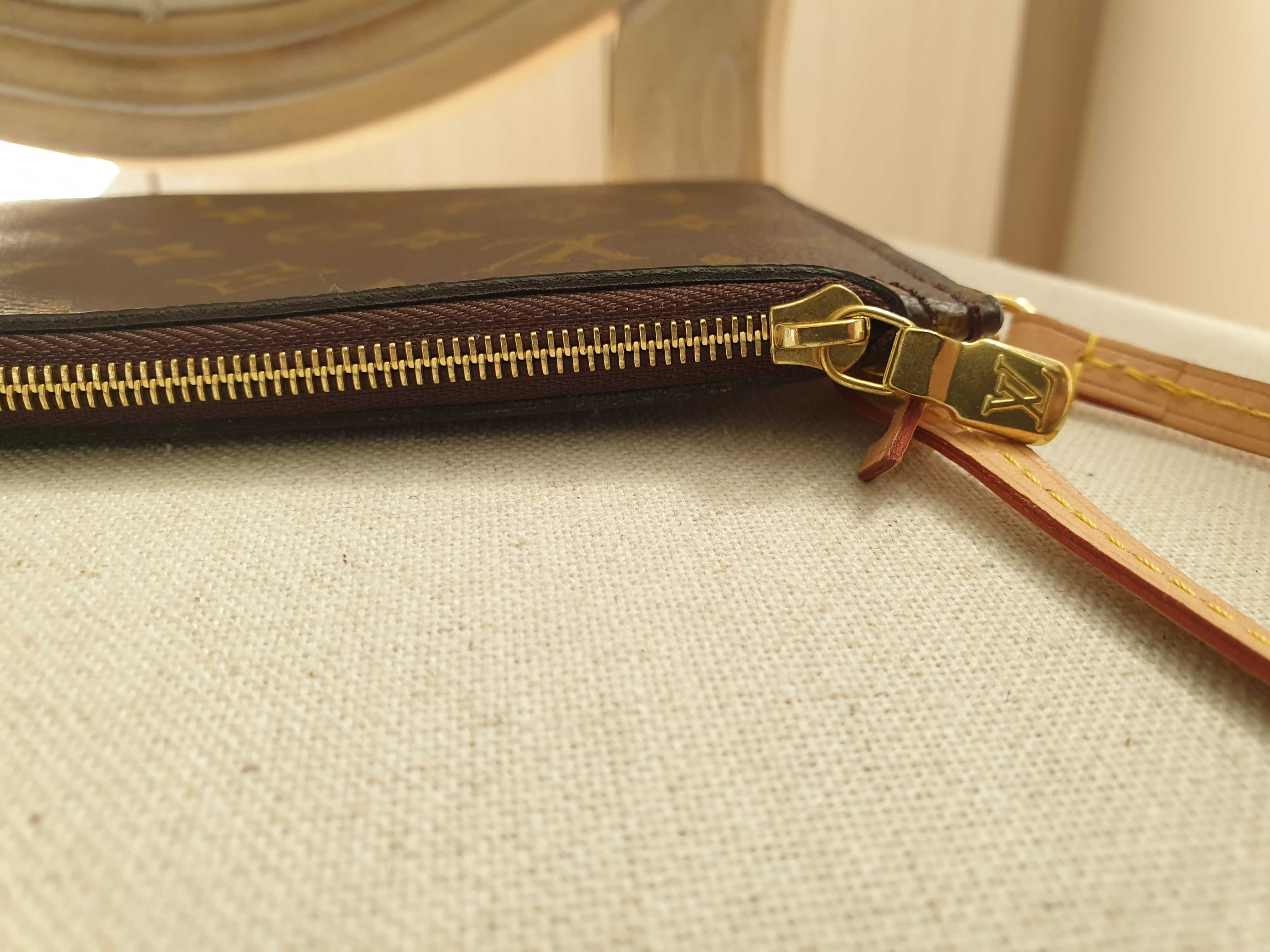 Oryginalna kopertówka marki Louis Vuitton Neverfull , nie noszona