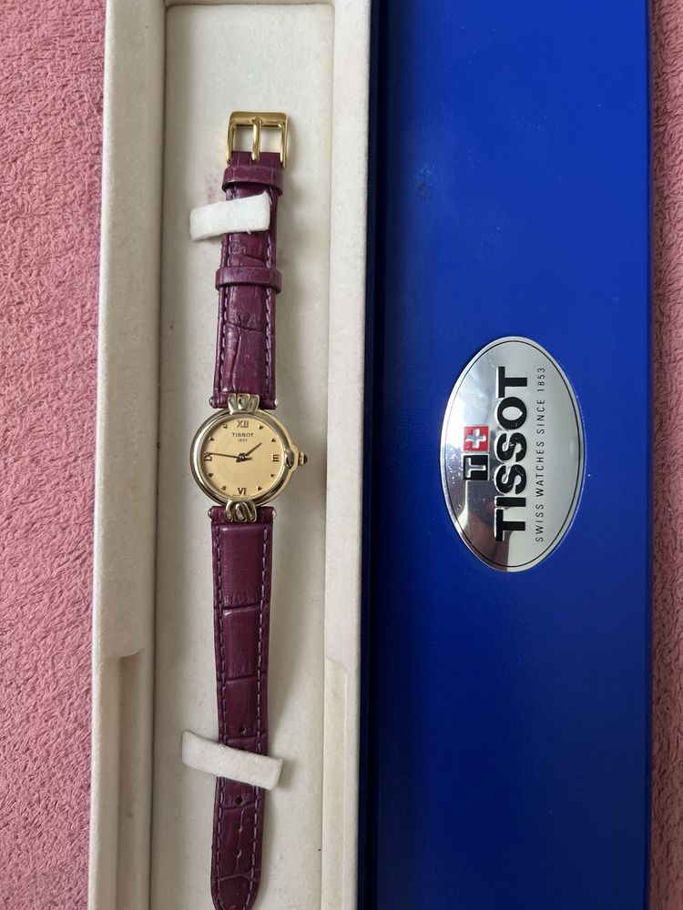 Годинник Tissot……………
