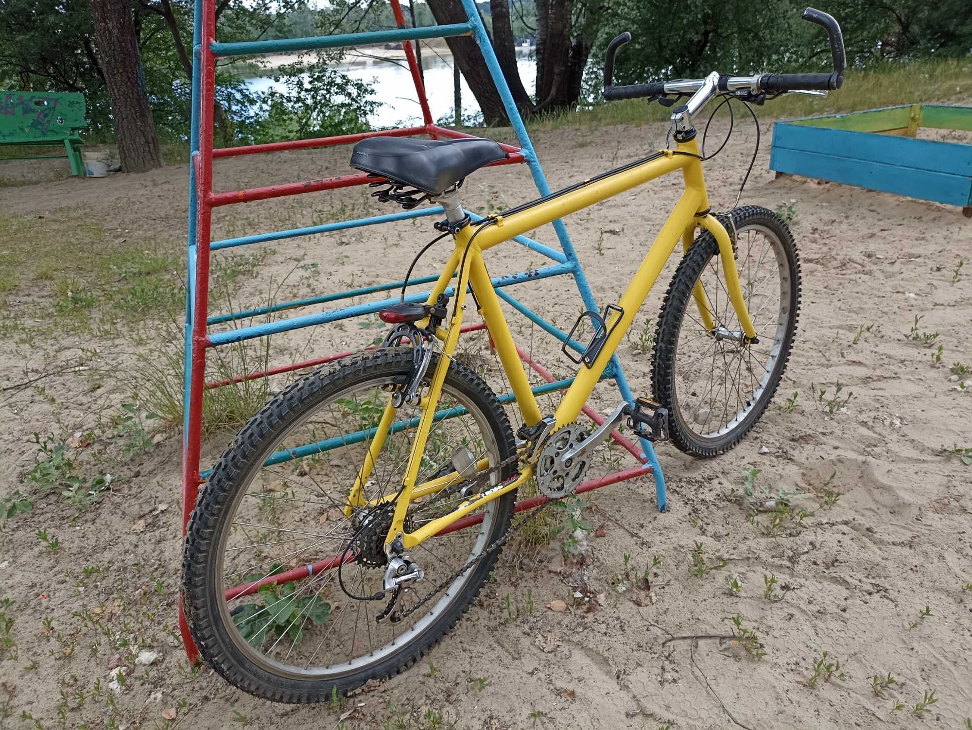 Продам алюминиевый велосипед Trek 26"желтый в хорошем состоянии