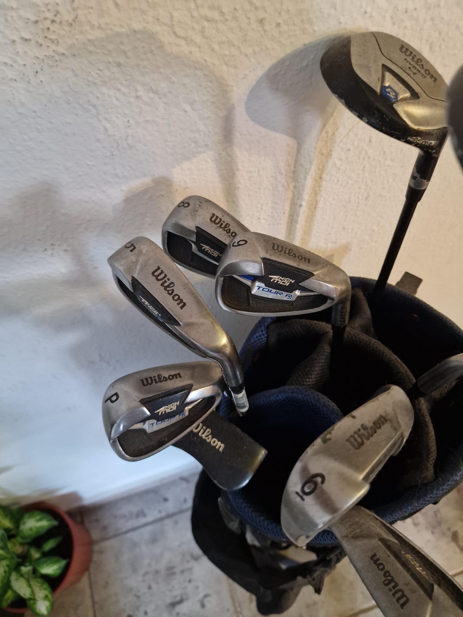 Saco de golf + 10 tacos.