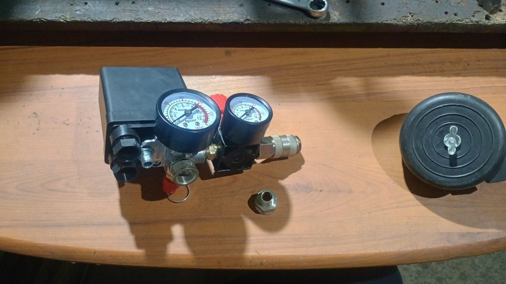 Обратний клапан на компресора