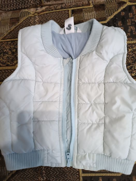 Продам жилетку детскую