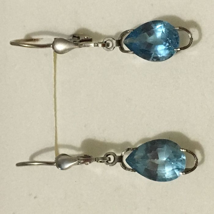 Złote kolczyki z topazami