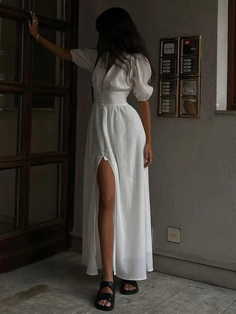 Nowa elegancka biała sukienka maxi z dekoltem w serek R. XXL