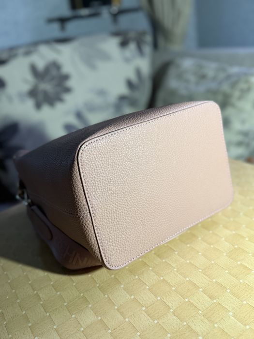 Жіноча сумка OCHNIK рожева з ремінцем