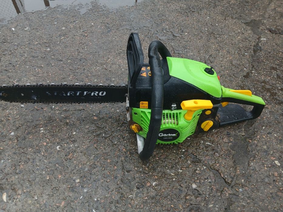 Бензопила с шиной и цепкой