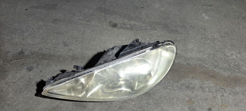 Farol esq. Peugeot 206
