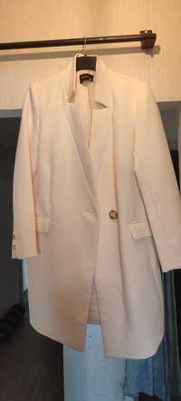 Піджак біло- персикового кольору новий