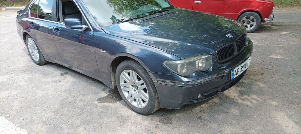 Bmw e65 730d 2002 читайте опис