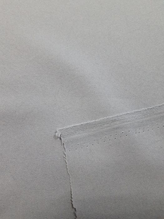 Tkanina jasny popiel szer.152 cm.