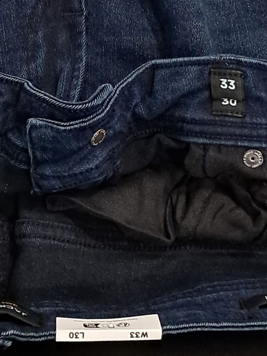 calças de ganga de homem