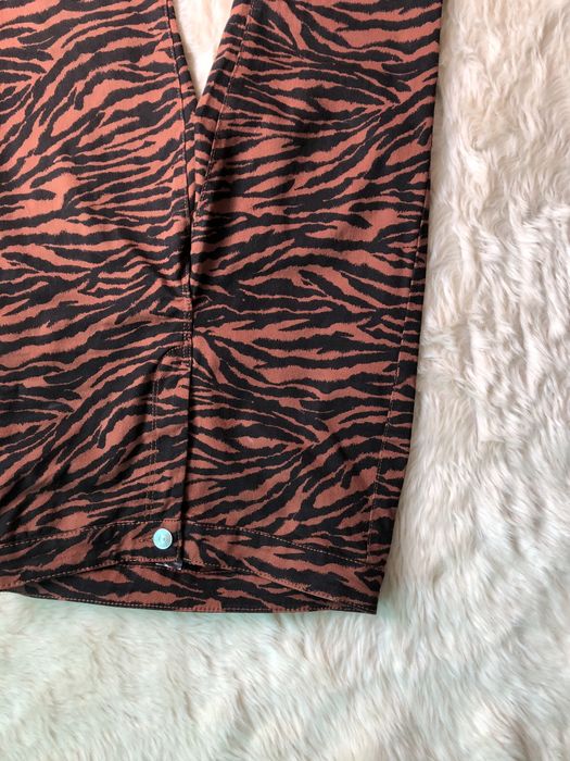 Джинси з приниом зебри від H&M