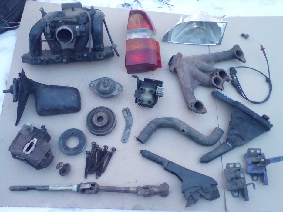 Коллектор форд эскорт 16v штаны балка катушка трапеция и другое