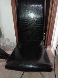 Cadeiras de pele preta