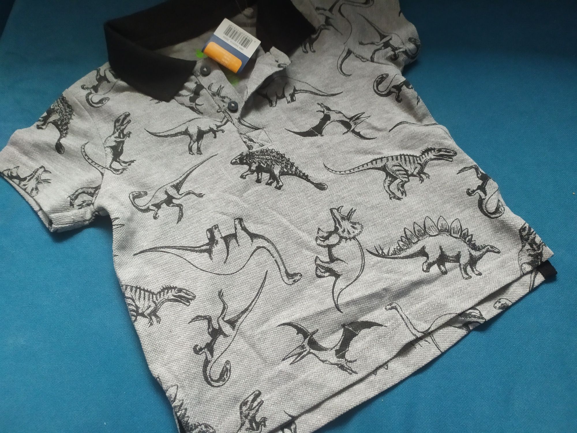 Nowy t-shirt polo elegancki w dinozaury dluzszy tyl gruba bawełna