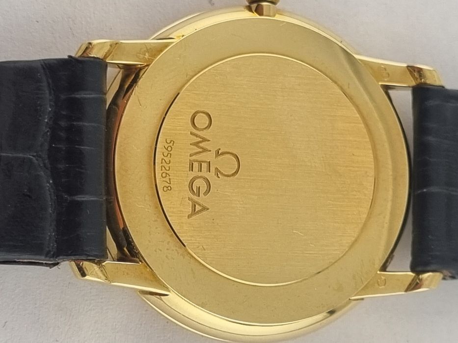 Золотые часы Omega