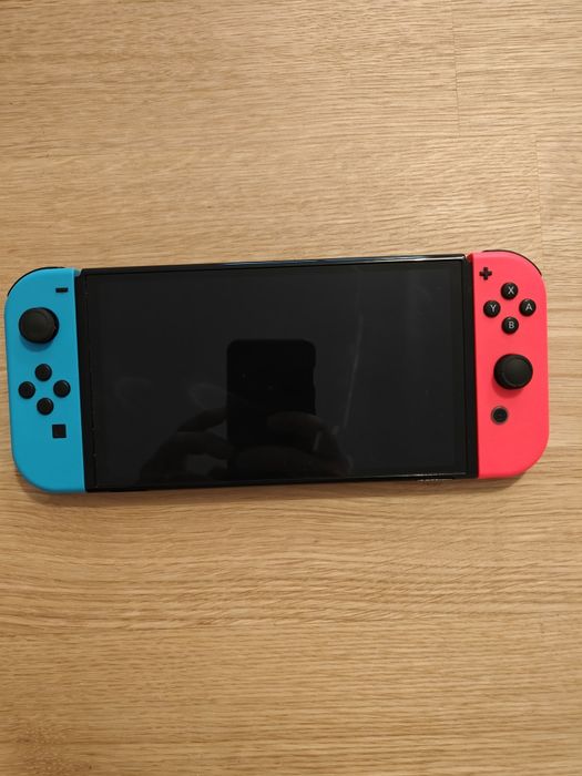 Nintendo switch Oled + 3 jogos + Ring fit