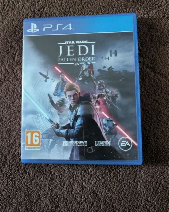 PlayStation 4 Pro (1 terabyte) + 2 comandos + phones + 2 jogos físicos