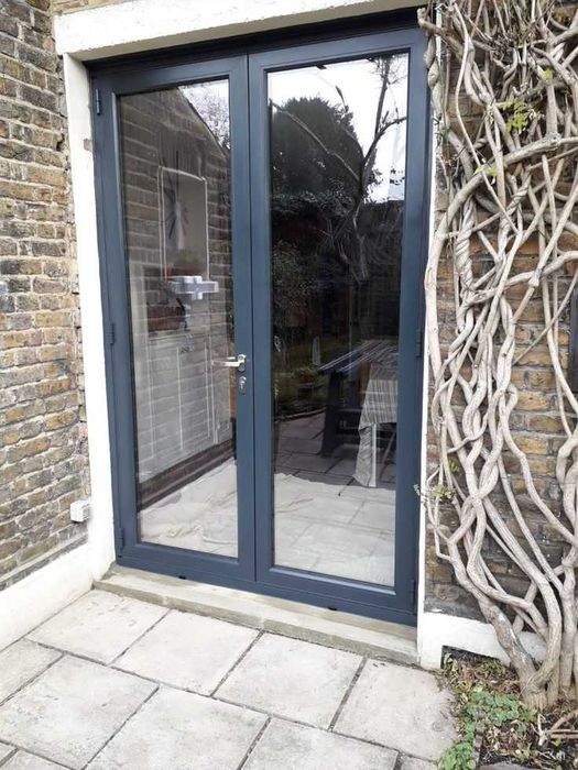 Розсувні двері металопластикові Антрацит вихід на терасу Київ