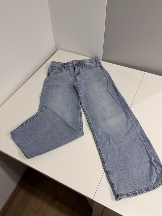 Spodnie H&M jeansy dla dziewczynki szeroka nogawka 152 cm